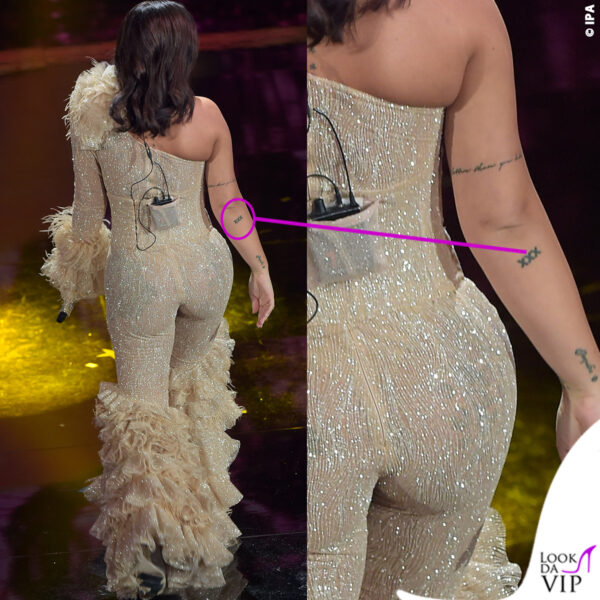 La scritta XXX sul braccio verrà eliminata (l'abito Marinella Spose è quello sfoggiato a Sanremo)
