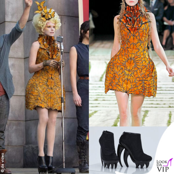 Elizabeth Banks interpreta Effie: molti dei suoi abiti sono Alexandre McQueen,. Le calzature di questo outfit sono di Iris Van Herpen 