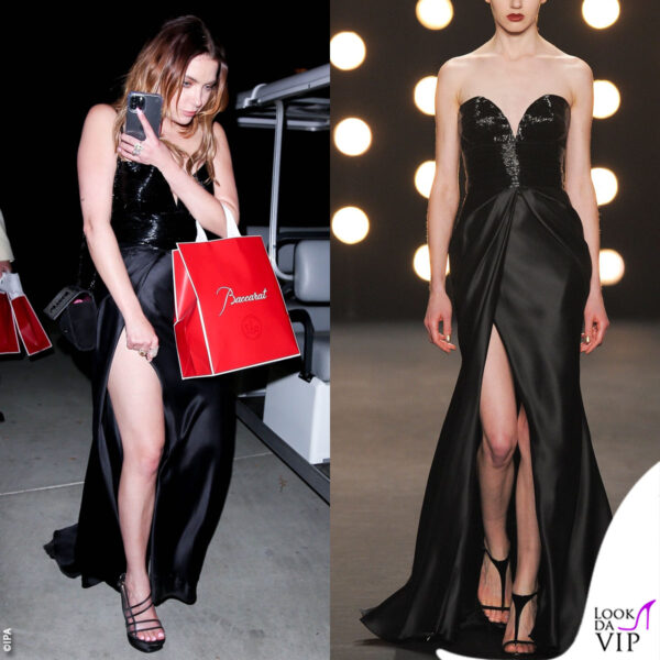 Spacco pericoloso per Ashley Benson, con un abito nero di Naemm Khan