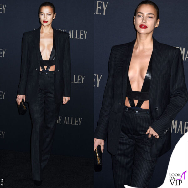 Irina ha optato per un look bollente firmato Burberry: completo gessato e sensuale body in pelle 