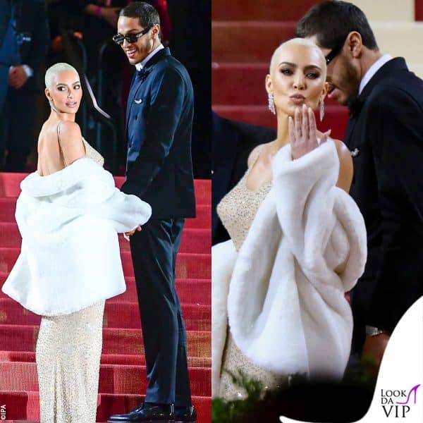 La star non ha mai tolto la stola di pelliccia bianca, a coprire il retro del vestito aperto 