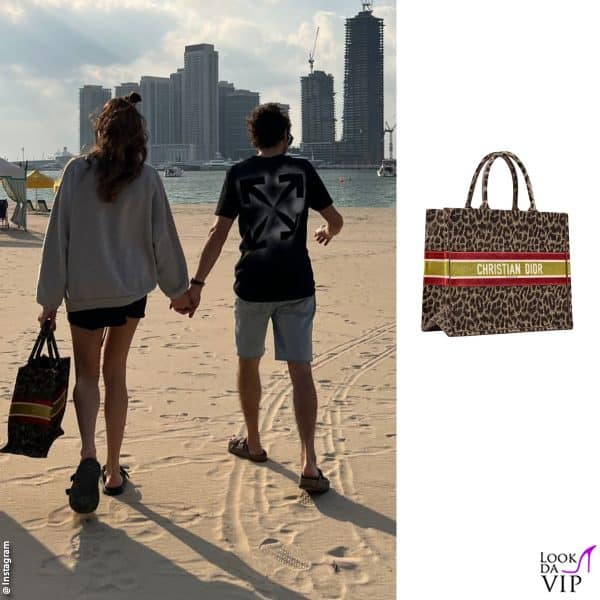 mano nella mano con Valentino Rossi (borsa Dior) 
