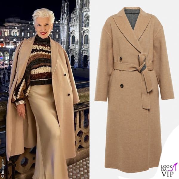 Elegante alla presentazione del suo libro a Milano, cappotto Brunello Cucinelli