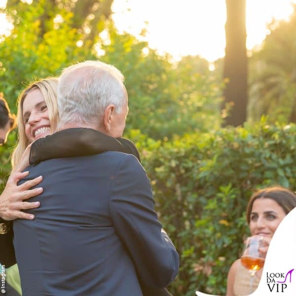 un abbraccio tra Michelle Hunziker e Santo Versace 