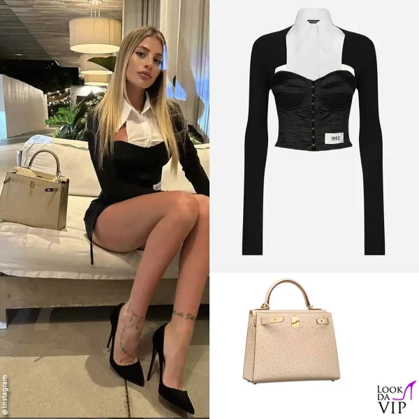 a Miami con un top Dolce&Gabbana e una borsa Hermès 