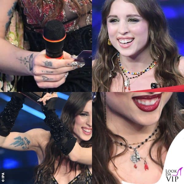 tatuaggi, collanine (di Collanine Colorate), unghie 3D e anelli: lo stile unico di Angelina (gli orecchini della serata finale sono di Ottaviani)