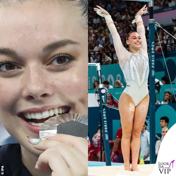 Giorgia Villa, argento nella finale a squadre della ginnastica artistica femminile, morde la medaglia e mostra le unghie con un delicato tricolore 