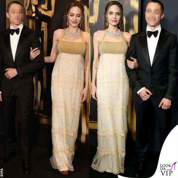 Angelina cambia lato ma non molla il braccio del figlio, elegantissimo con lo smoking