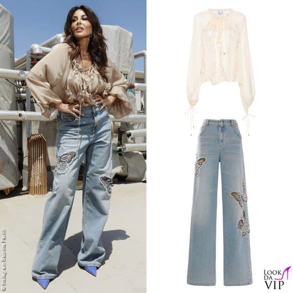 Sabrina Ferilli indossa un total look Blumarine: sui pantaloni volano romantiche farfalle