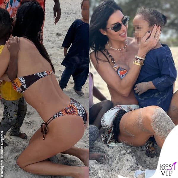 Elisabetta gioca in spiaggia con i bambini kenioti 