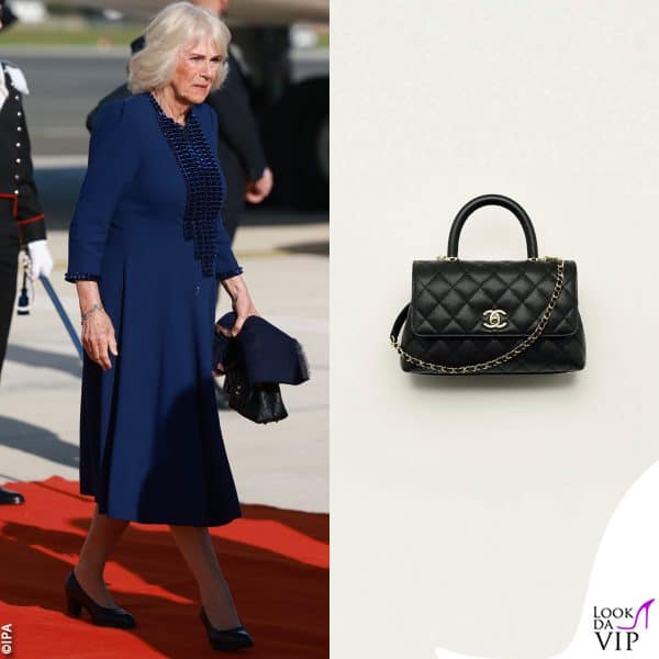 il look di Camilla: abito Fiona Clare, scarpe Eliot Red, borsa Chanel