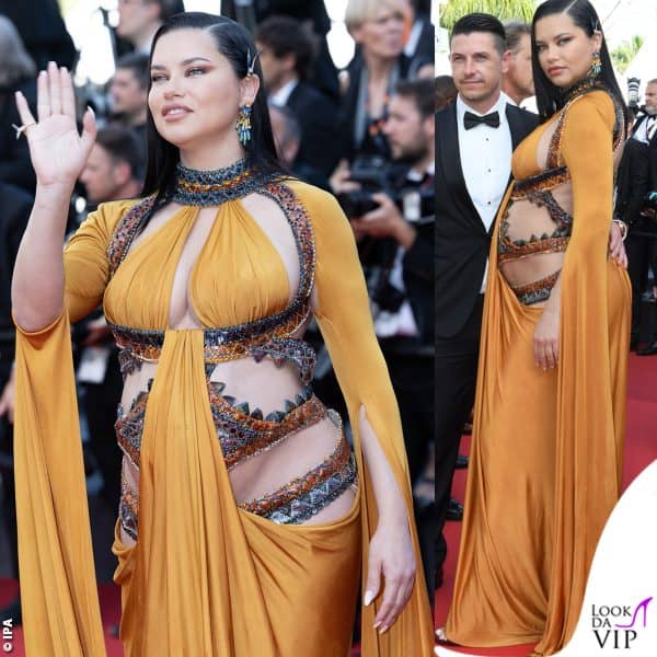 Nel 2022 Adriana Lima copre il pancione con  l'intricato abito Nicolas Jebran 