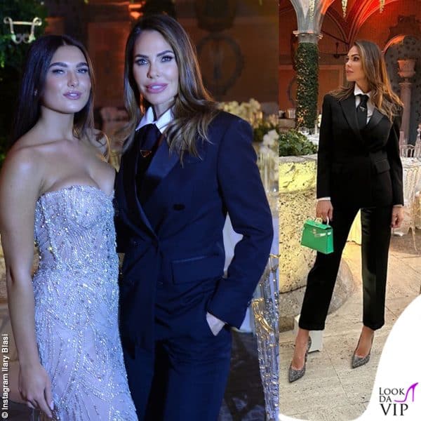 Ilary Blasi ha indossato un completo nero Dsquared2, abbinandolo a  cravatta Prada e borsa Hermes 