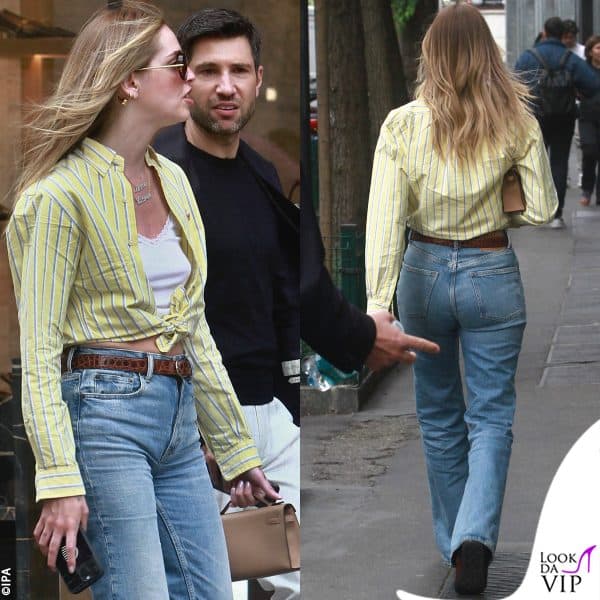 per lei jeans, camicia a righe annodata e "Mini Kelly" di Hermès 