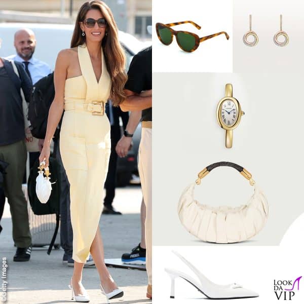 abito e borsa Balmain, scarpe Prada, orecchini e orologio Cartier, occhiali Heidi London