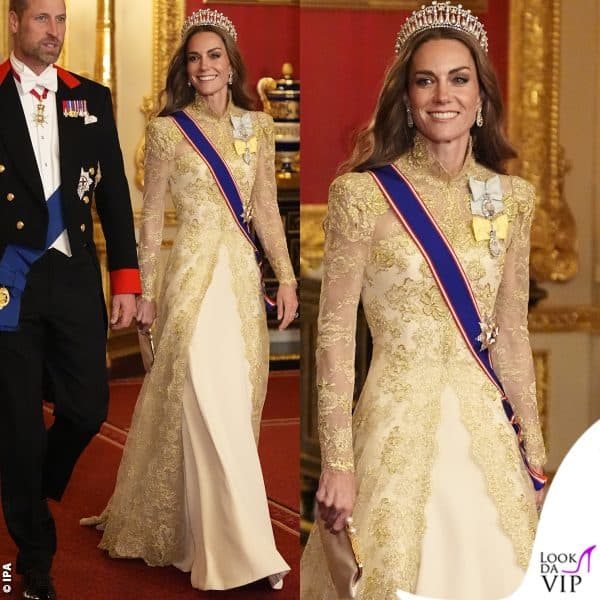 Al banchetto ufficiale con una clutch Maud abbinata al pizzo color champagne dell'abito Phillipa Lepley
