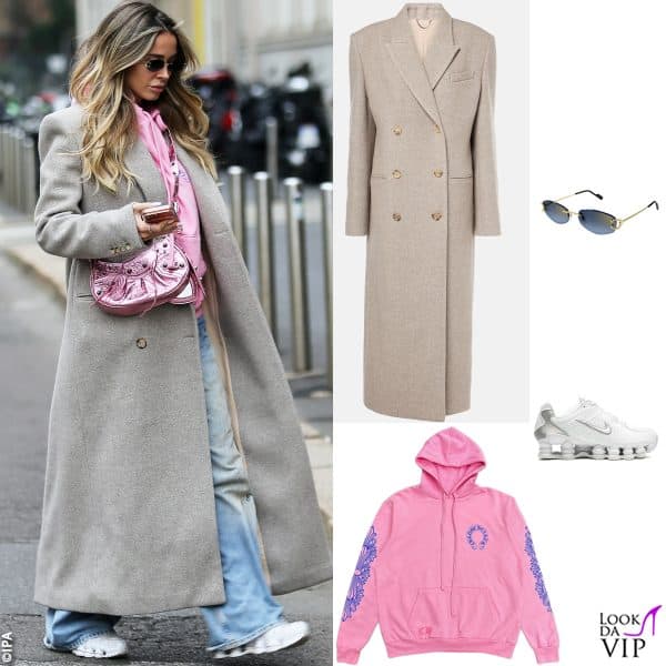 cappotto Magda Butrym, occhiali Cartier, felpa Chrome Hearts, sneakers Nike, borsa Balenciaga 