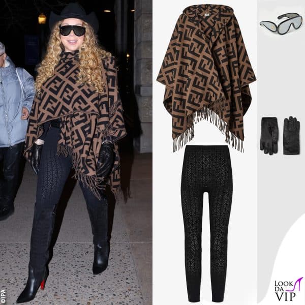 poncho Fendi, occhiali Loewe, top e collant Alaia, guanti Gucci