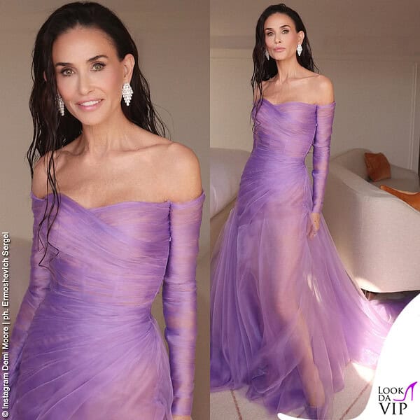 Tulle e trasparenze nell'abito scenografico  Gucci, accessoriato da  gioielli Chopard